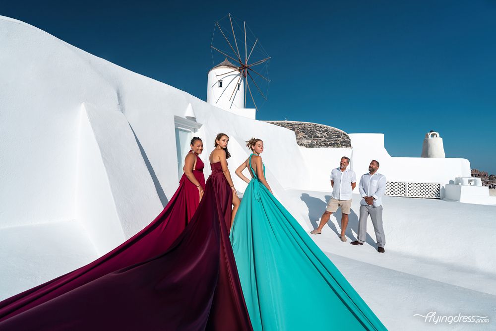Oia, Santorini flying dress photoshoot with gay couple