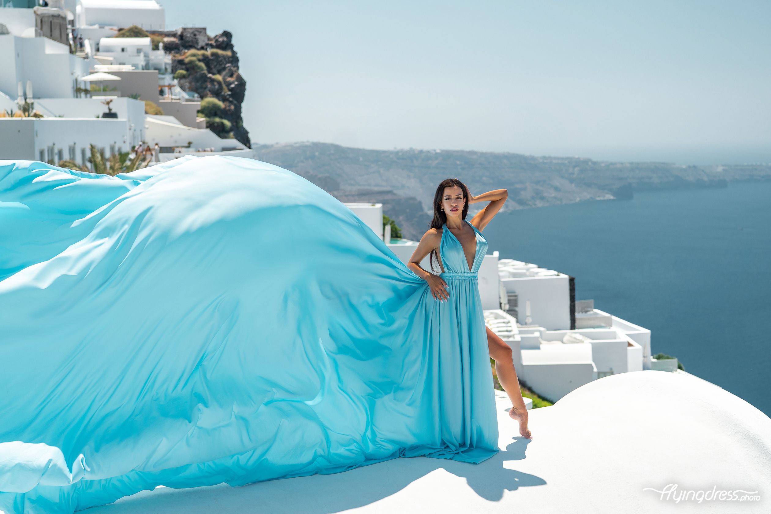 Baby blue flying Santorini dress photoshoot