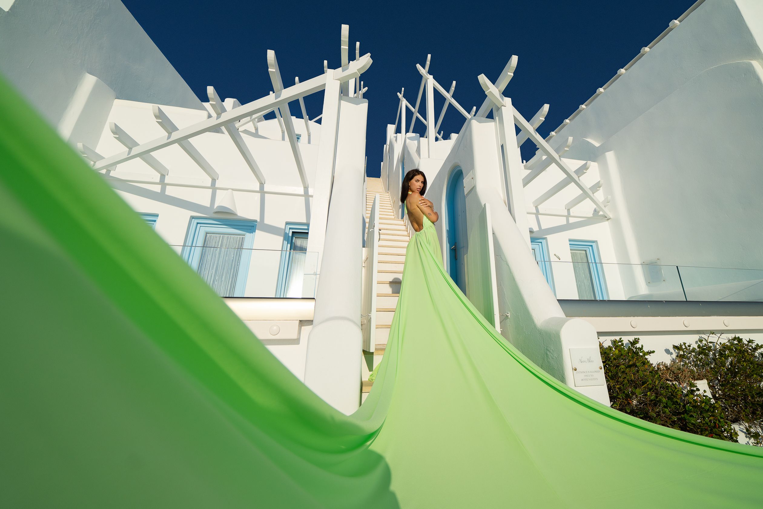 Santorini flying dress photoshoot with a nice model