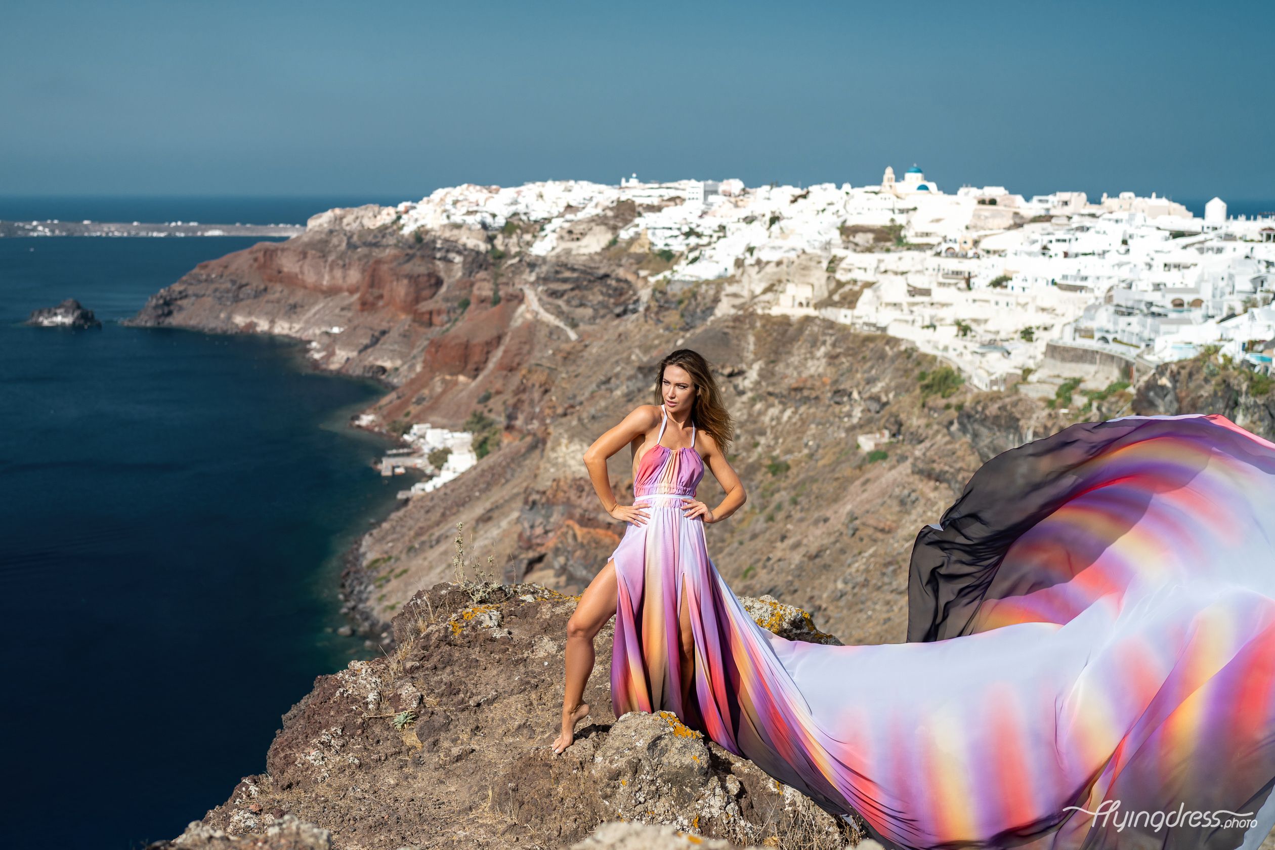 Flying dress shoot in Santorini, Greece