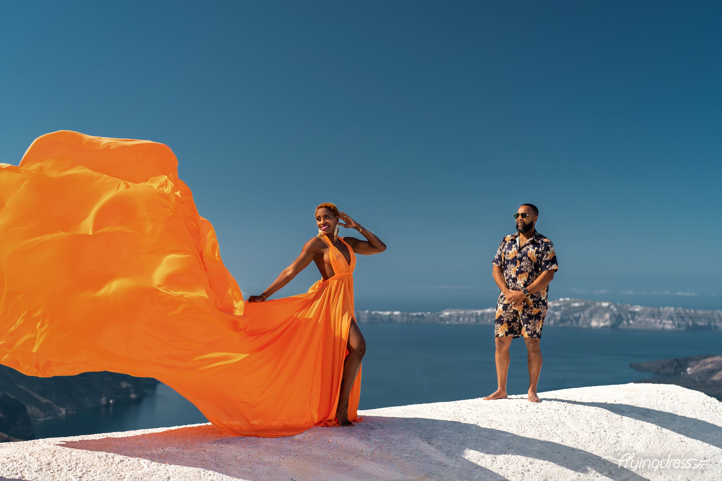 Santorini flying dress couple photoshoot