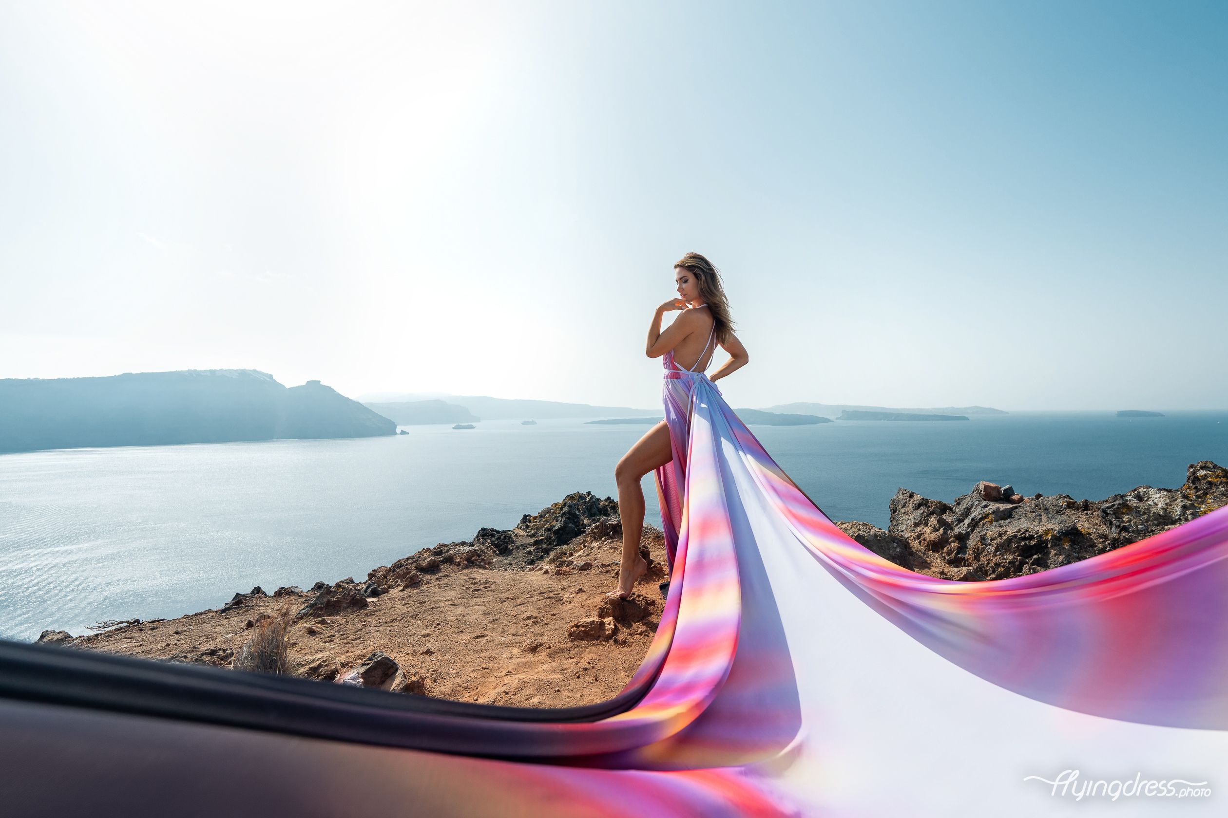 Multicolor ombre flying dress photoshoot with caldera view