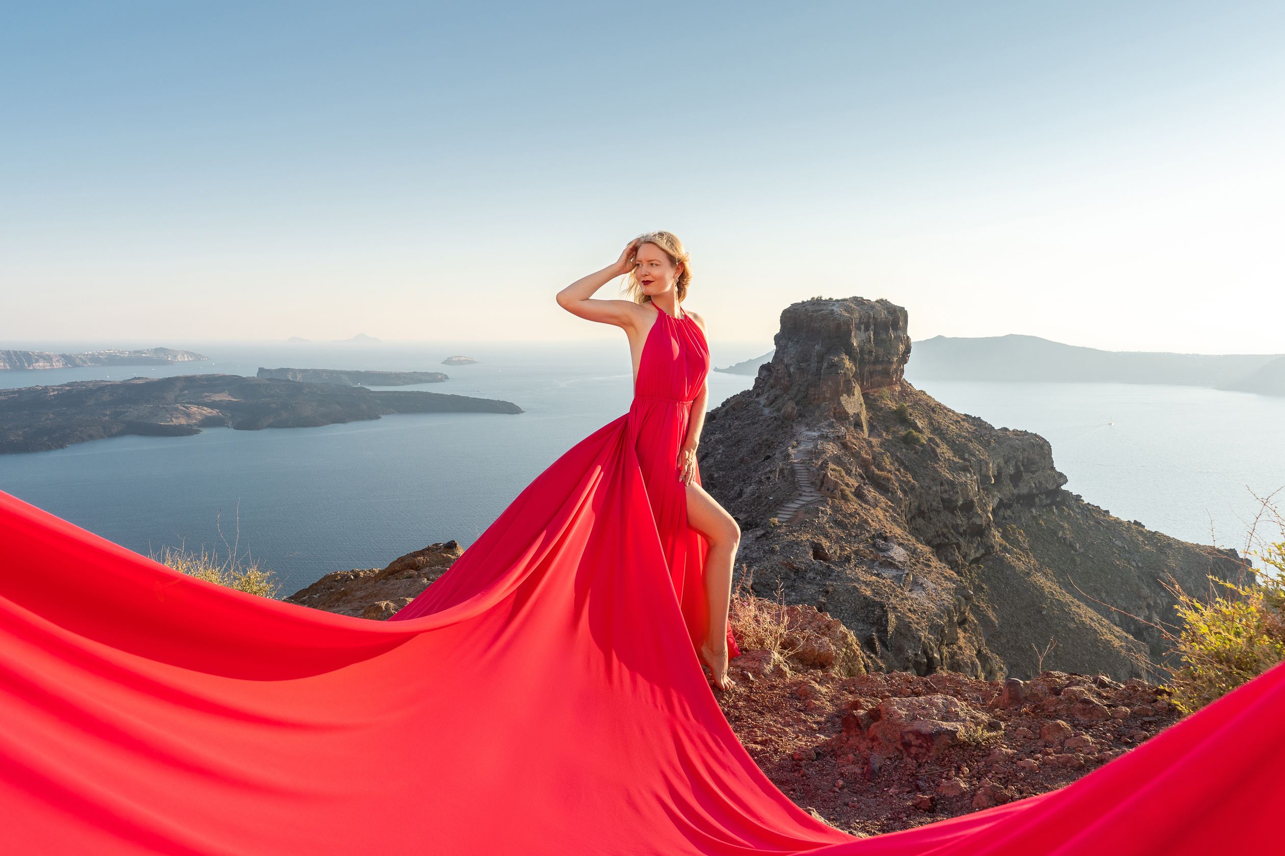 Flying Santorini dress photoshoot in Imerovigli, Greece