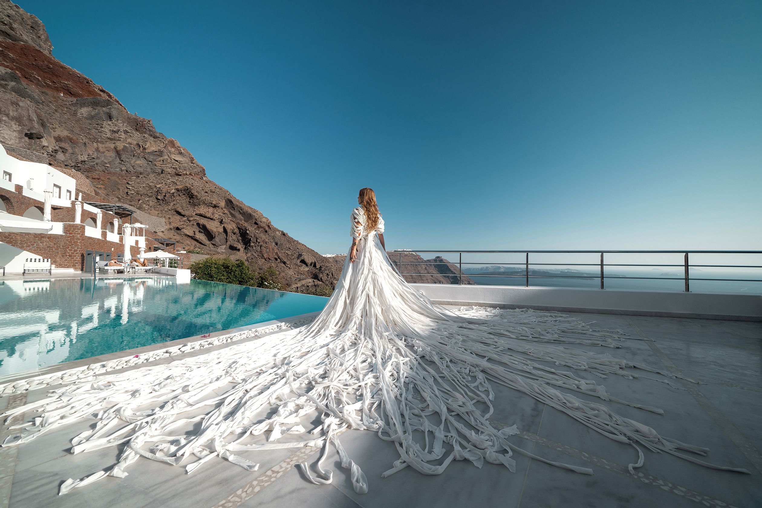 Photoshoot at the San Antonio hotel in Santorini with an amazing designer's dress