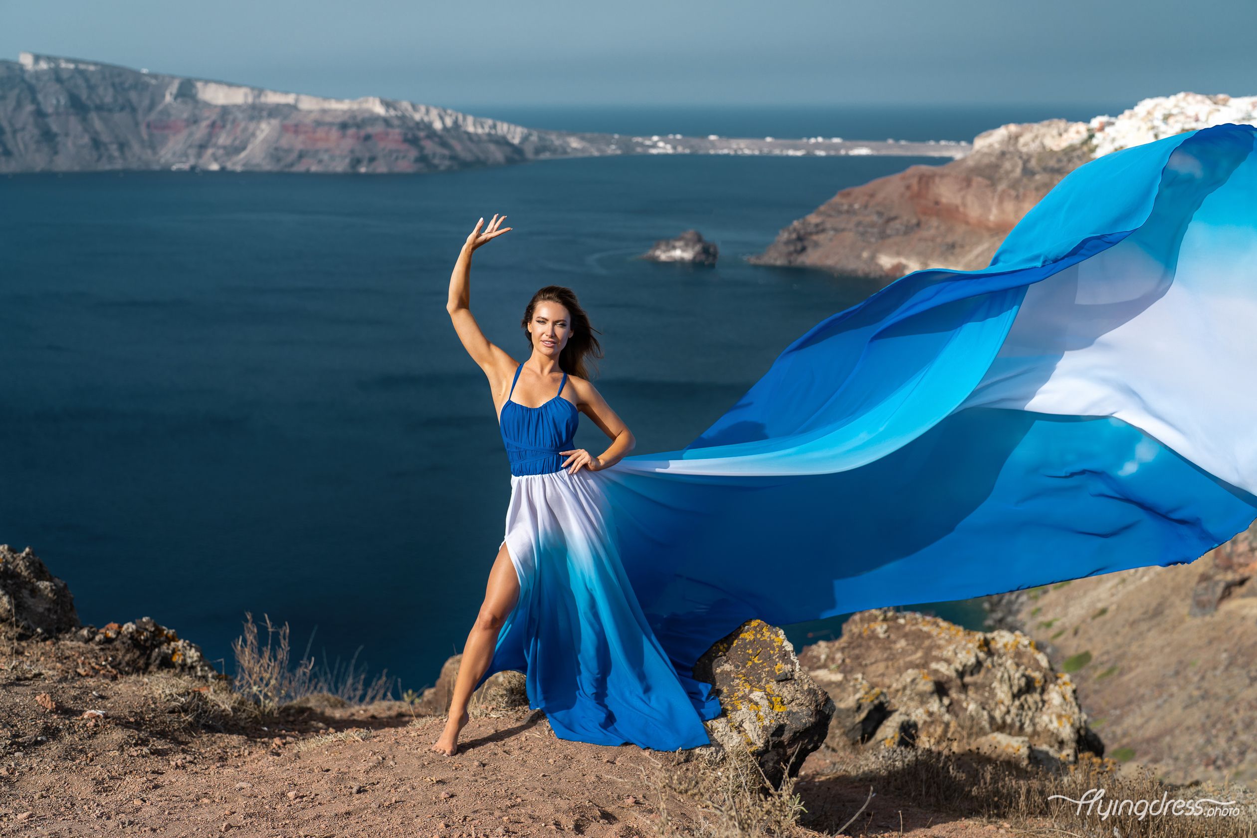 Ombre flying dress shoot in Oia village, Santorini