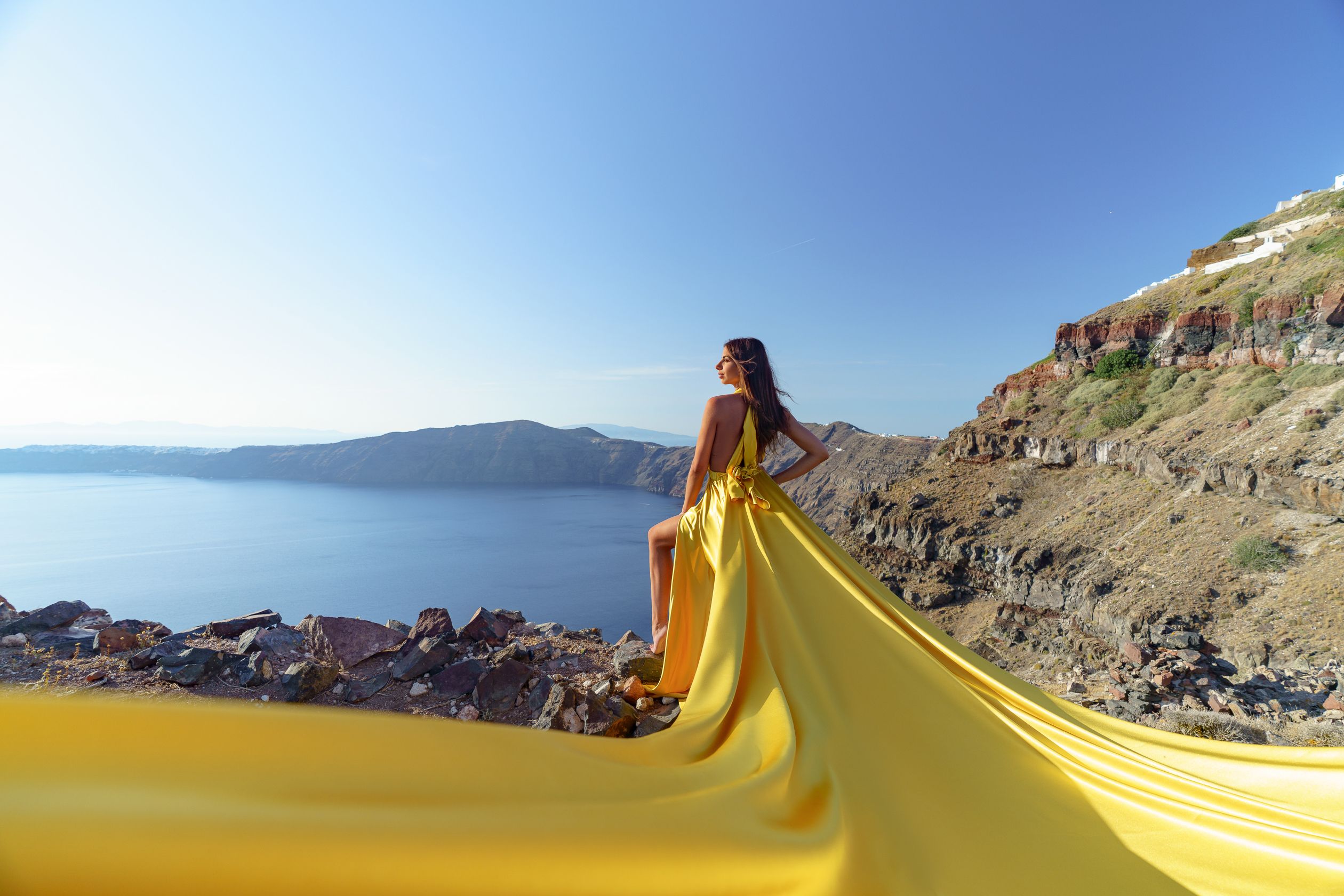 Imerovigli Santorini yellow dress photo