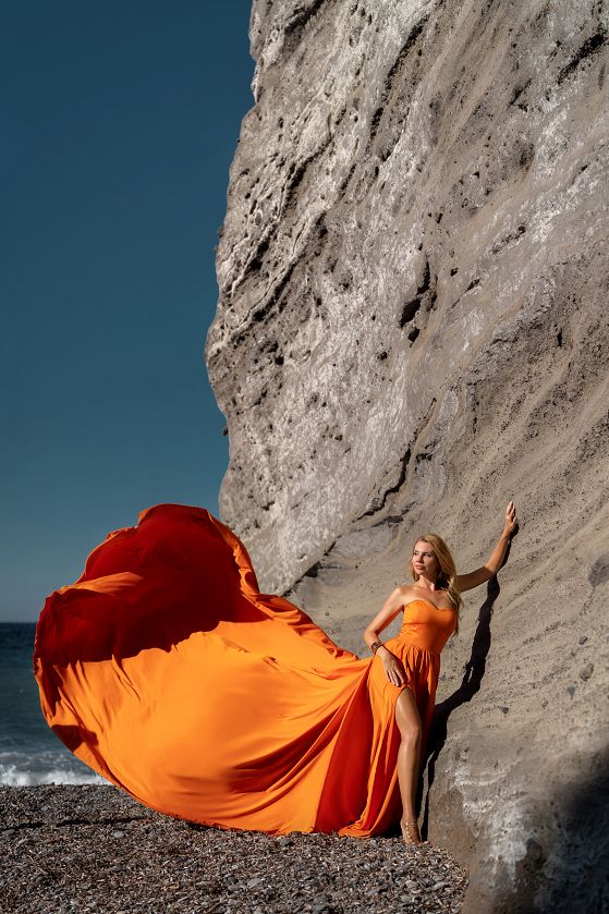 Orange Santorini flying dress shoot