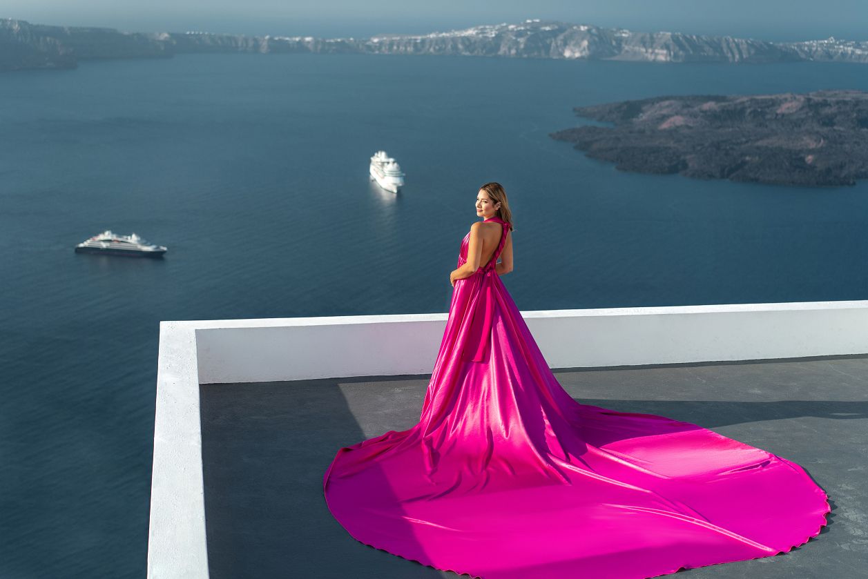 Imerovigli, Greece flying Santorini dress photoshoot