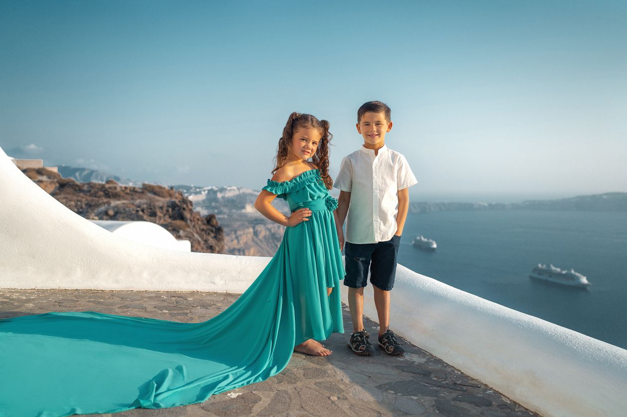 Kids flying Santorini dress photoshoot