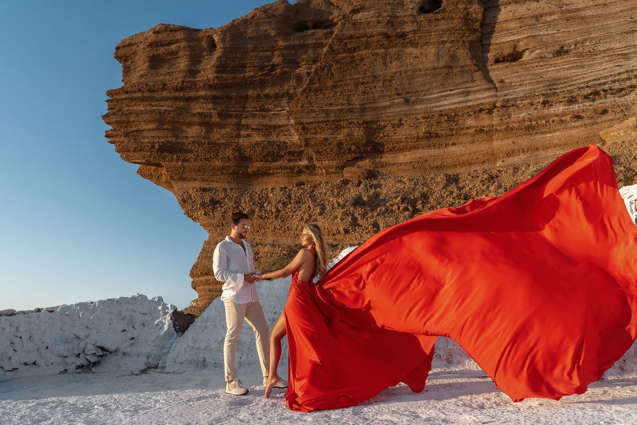 Hot red dress photoshoot in Santorini