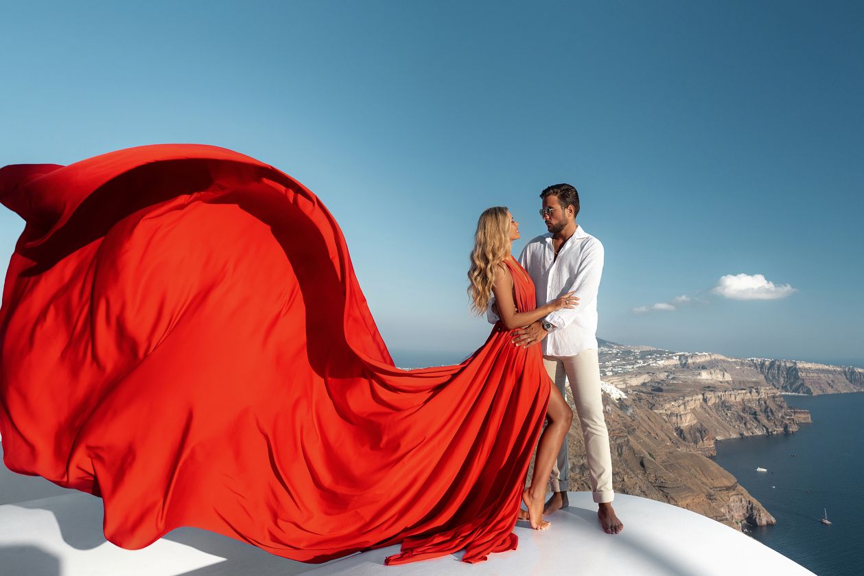 Love story photoshoot with a red Santorini dress