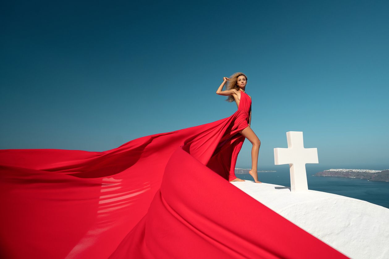 Flying red Santorini dress photoshoot