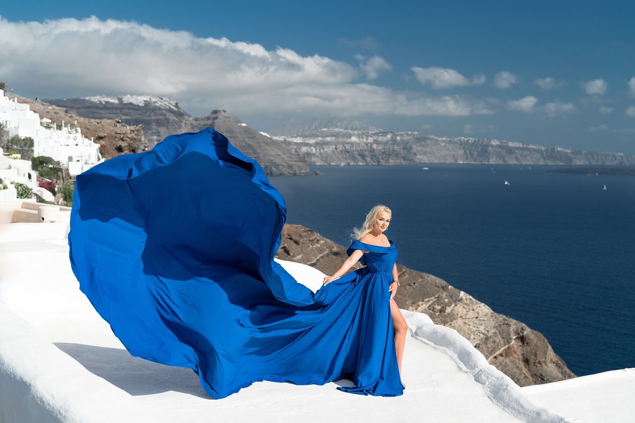 Oia, Santorini dress photoshoot with a blue dress