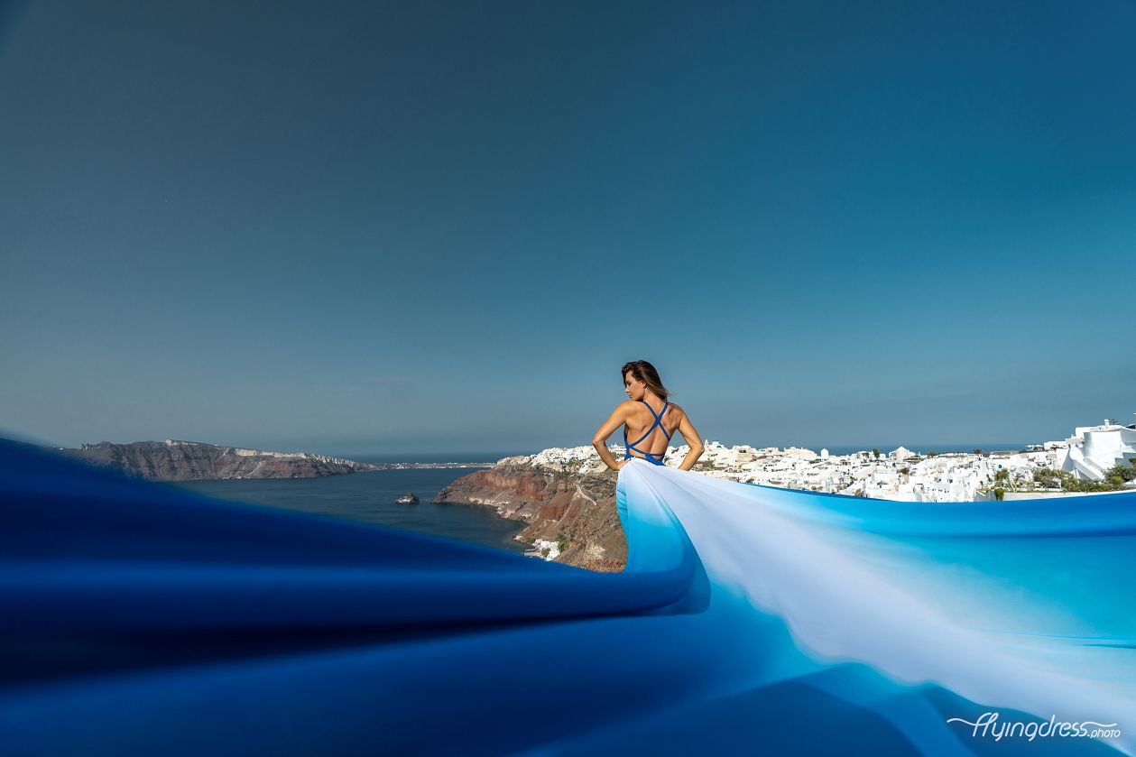 Santorini flying ombre dress photoshoot in Oia