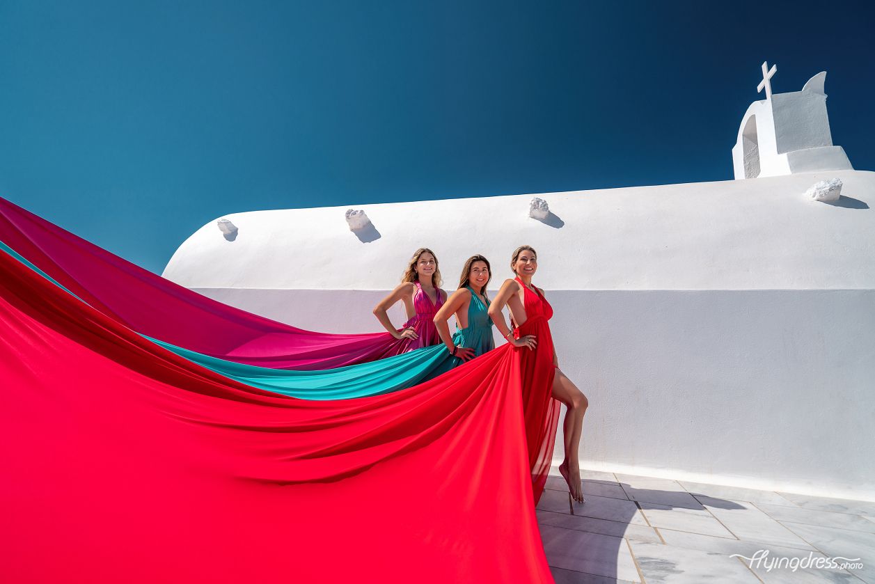 Group Santorini dress photoshoot in Oia, Greece