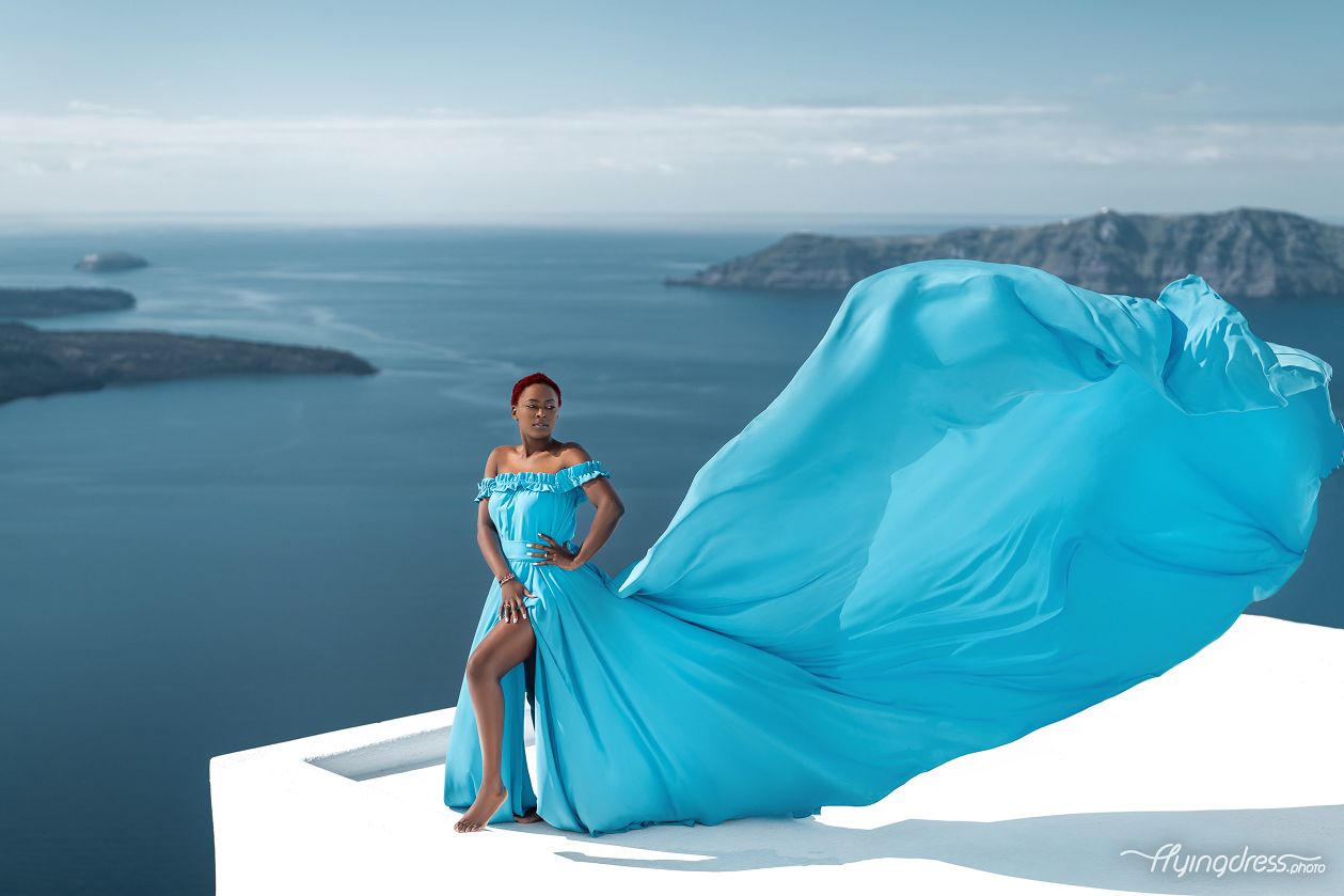 Flying Santorini dress photoshoot in Imerovigli