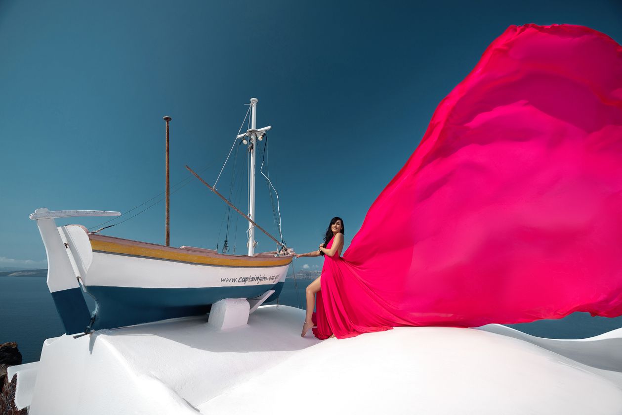 Fuchsia flying Santorini dress shoot