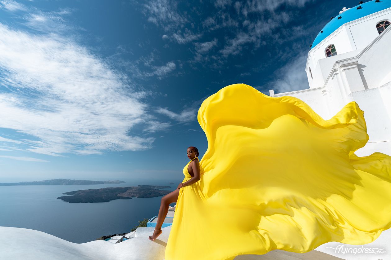 Santorini dress photoshoot by the blue dome