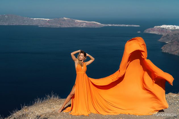 Flying orange Santorini dress photoshoot