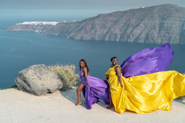 Black girls flying dress shoot in Santorini