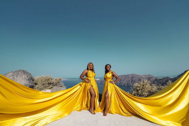 Black girls group shoot with a flying Santorini dresses