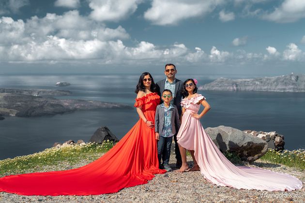 Santorini family photoshoot with the red flying dress