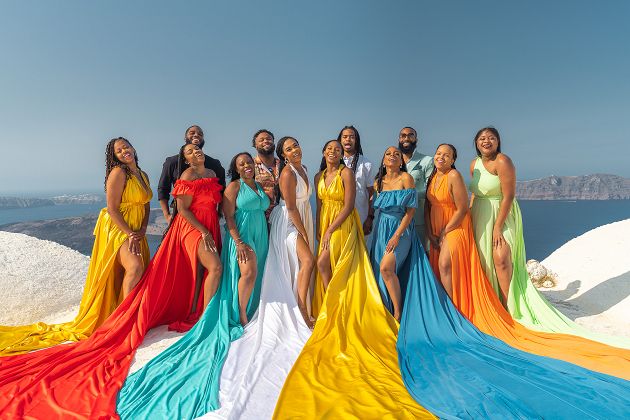 Big group shoot with a flying Santorini dresses