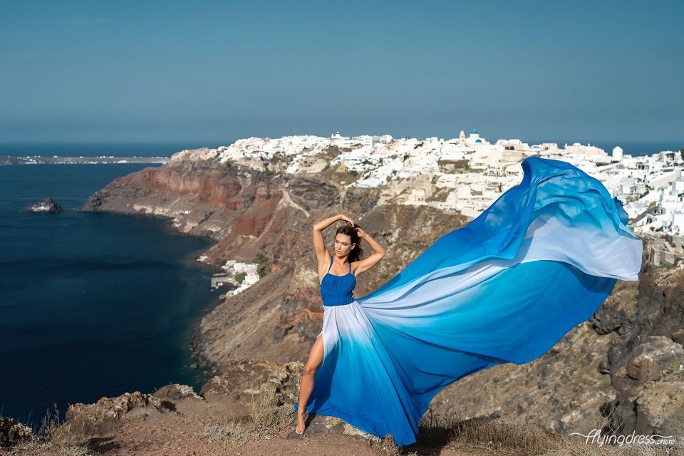 Blue flying dress photoshoot in Santorini