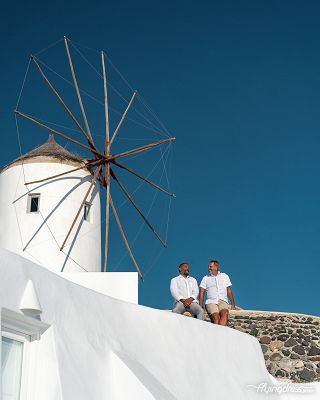 Gay couple photoshoot in Oia village, Santorini