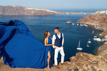 Royal blue flying Santorini dress shoot
