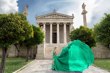 Model doing a flying dress photoshoot at the National University of Athens