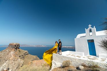 Yellow flying Santorini dress shoot
