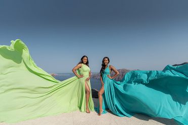 Black girls group flying dress photoshoot in Santorini
